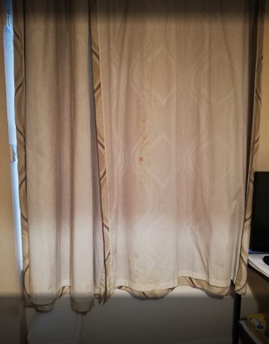 There are stained curtains