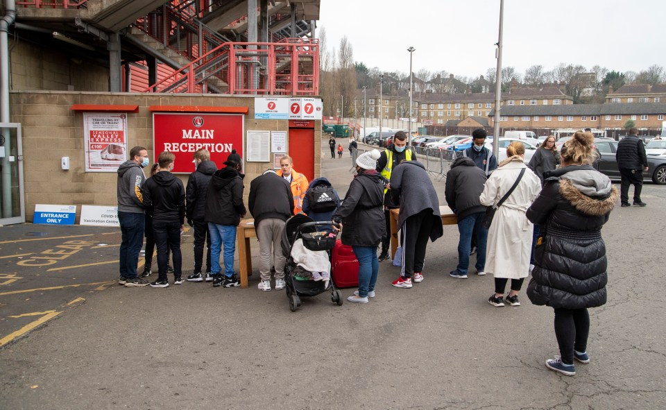 Carol singers entertained people waiting for a jab at The Valley