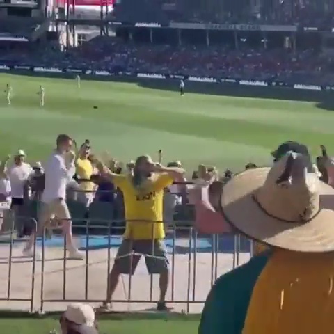 The long-haired supporter chugged his pints