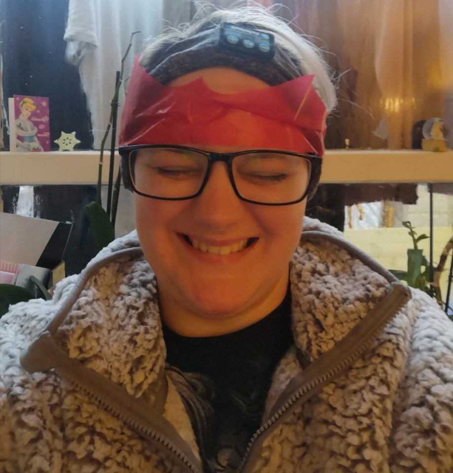 Louise Lansbury suffers with a condition which means that certain sounds can make her feel angry. She is pictured above wearing a headphone headband which helps block out the noise