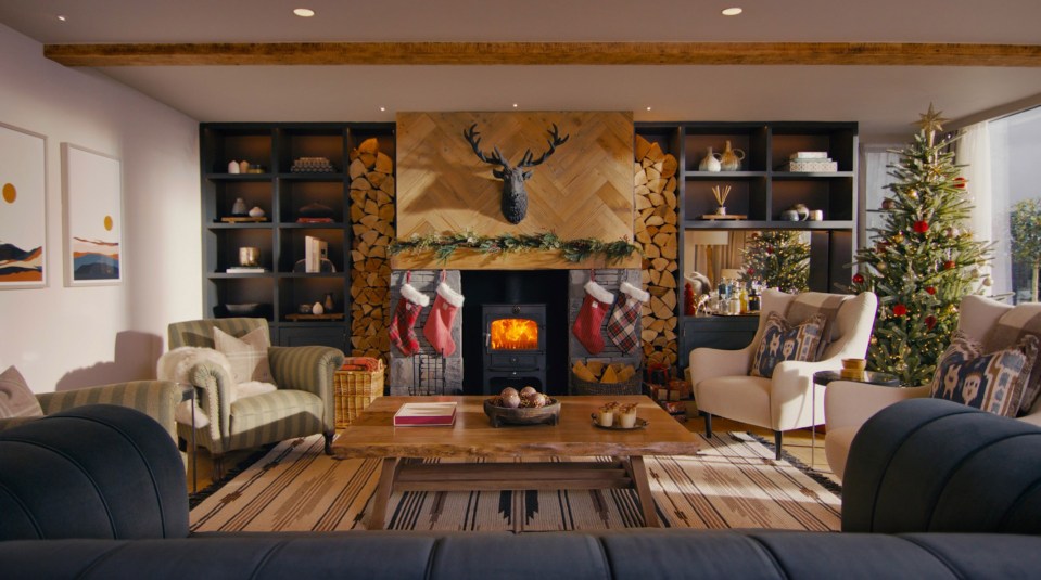 The living room has a cosy log burner perfect for Christmas