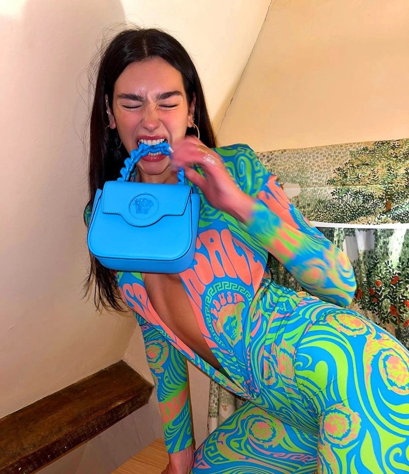 Dua Lipa wows in a psychedelic outfit as she spends Christmas in the UK