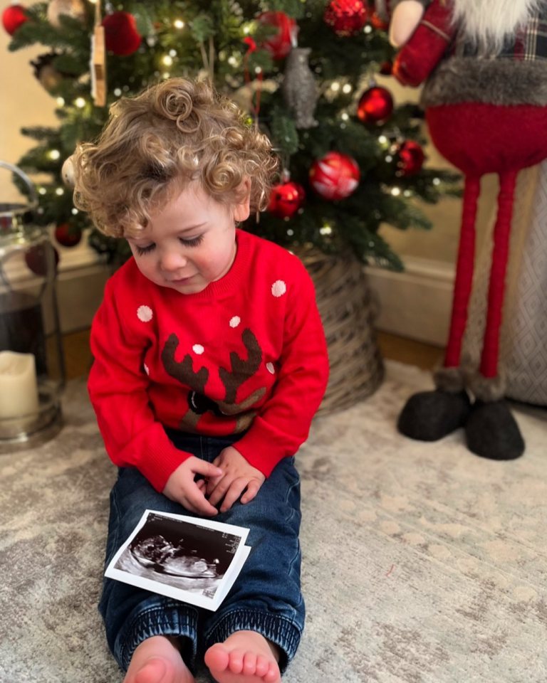 Their son Reggie helped to announce the news at Christmas