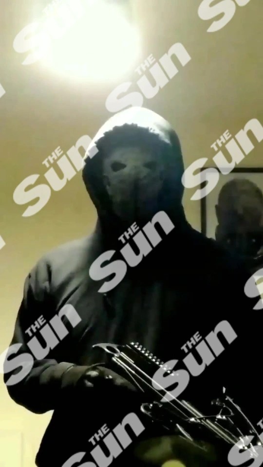 Footage obtained by The Sun showed a masked man with distorted voice holding a crossbow and referring to the massacre