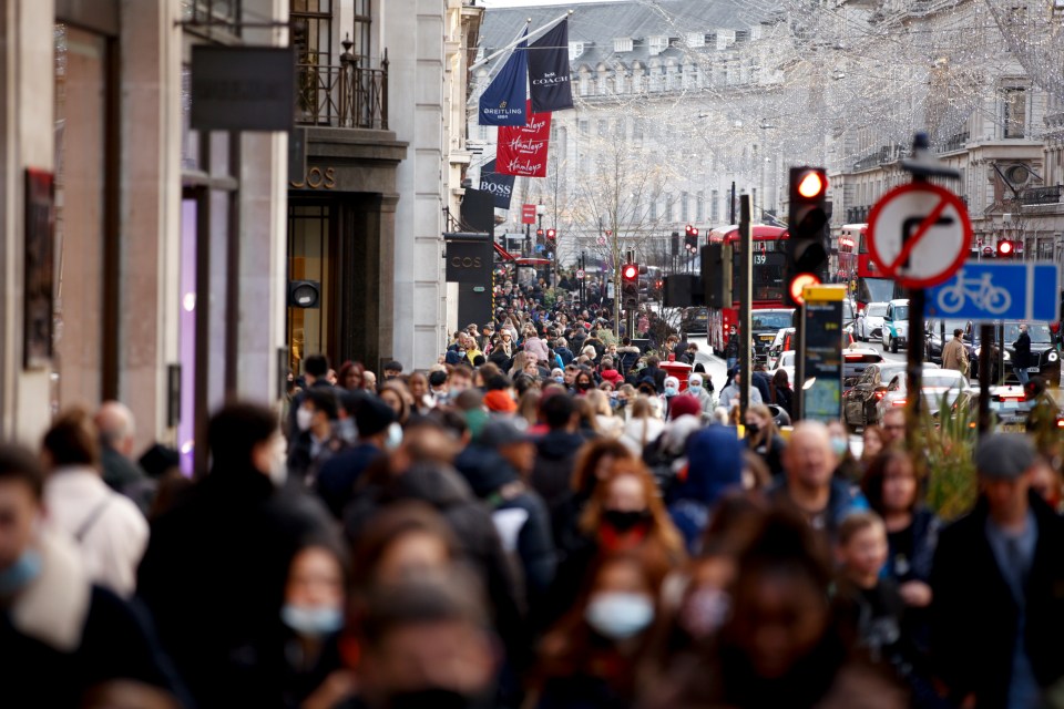 Covid-19 hospital admissions are DOWN more than 50 per cent. Shoppers in London, pictured