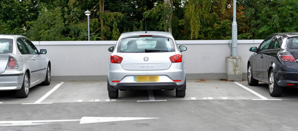 Bad inconsiderate parking in a full pay and display multi storey public car park