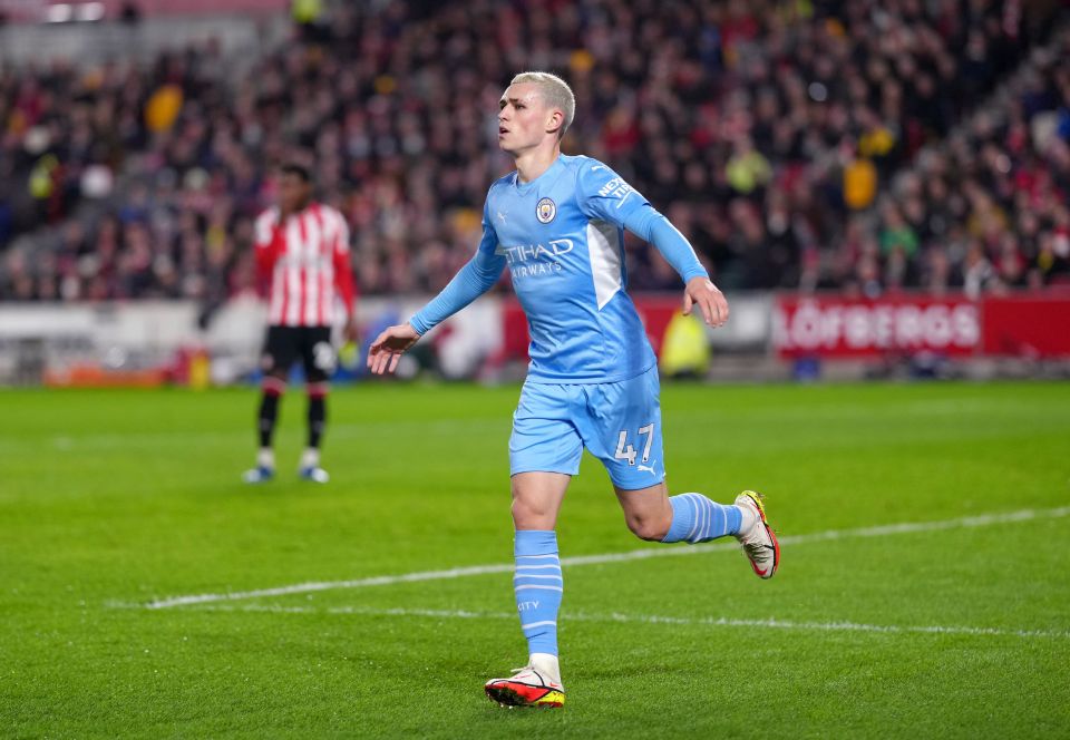 Phil Foden celebrates his opener against Brentford