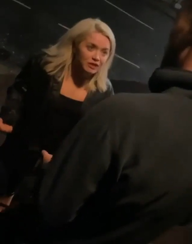 The woman, dressed in black launches a vile racist tirade at the man