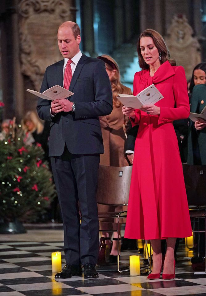 Kate was seen wowing in a festive Catherine Walker coat with large bow detail, a red dress, and the Queen Mother's sapphire fringe earrings