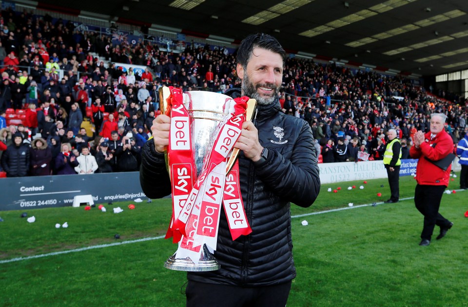 Danny Cowley celebrates taking the club into League One having already won promotion into the EFL