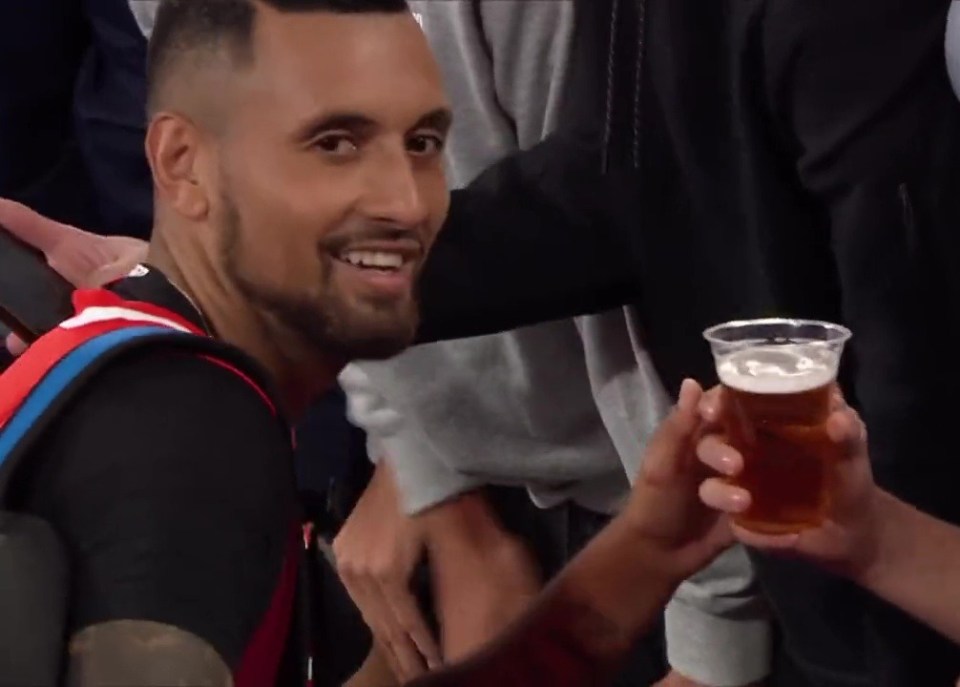 Nick Kyrgios grinned before taking a sip of the celebratory beer