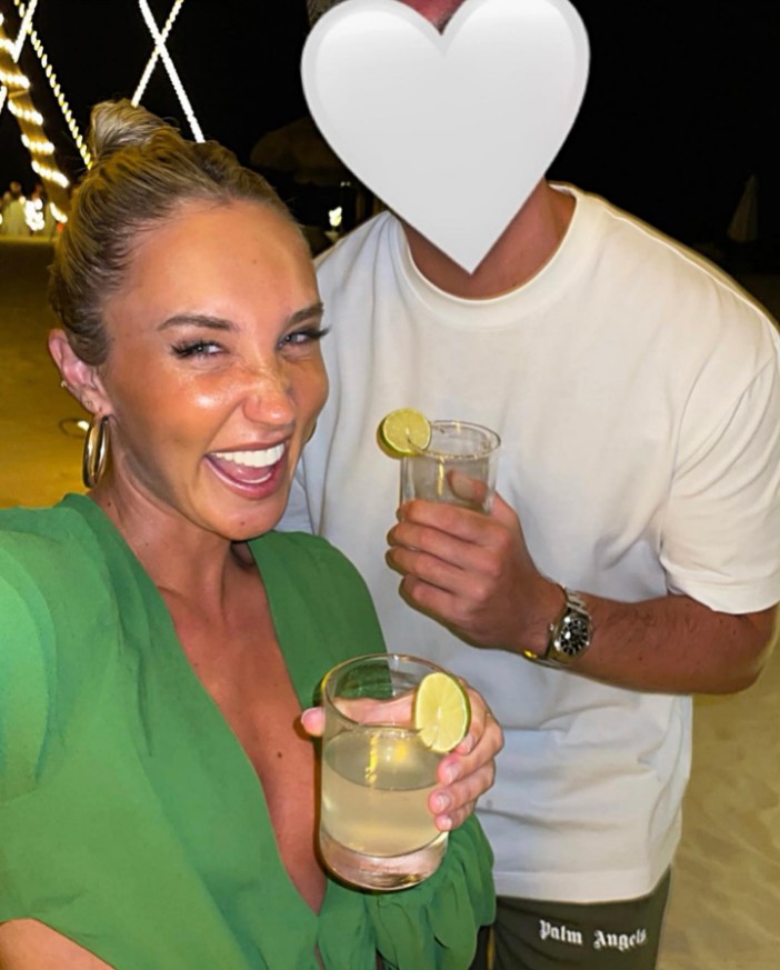 Josh - pictured here in the Maldives with Megan - covers his face on social media