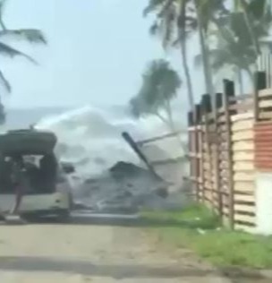 The moment the waves smashed the coastline as locals scrambled to evacuate in Tonga