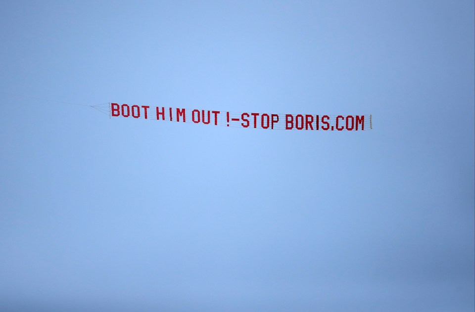 This anti-Boris Johnson banner was flown over Old Trafford before the game