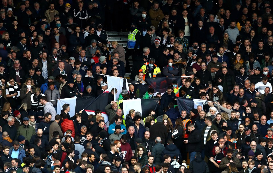 Fulham supporters waited on anxiously as the ill fan received treatment