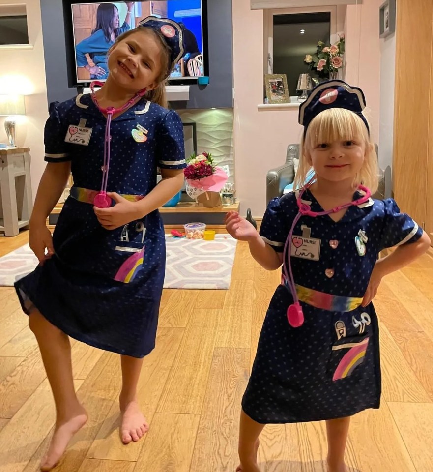 Jessica’s daughters, Ella, aged 8, left, and Emily, 5 right dressed up as nurses on her return home and wanted to help her get better