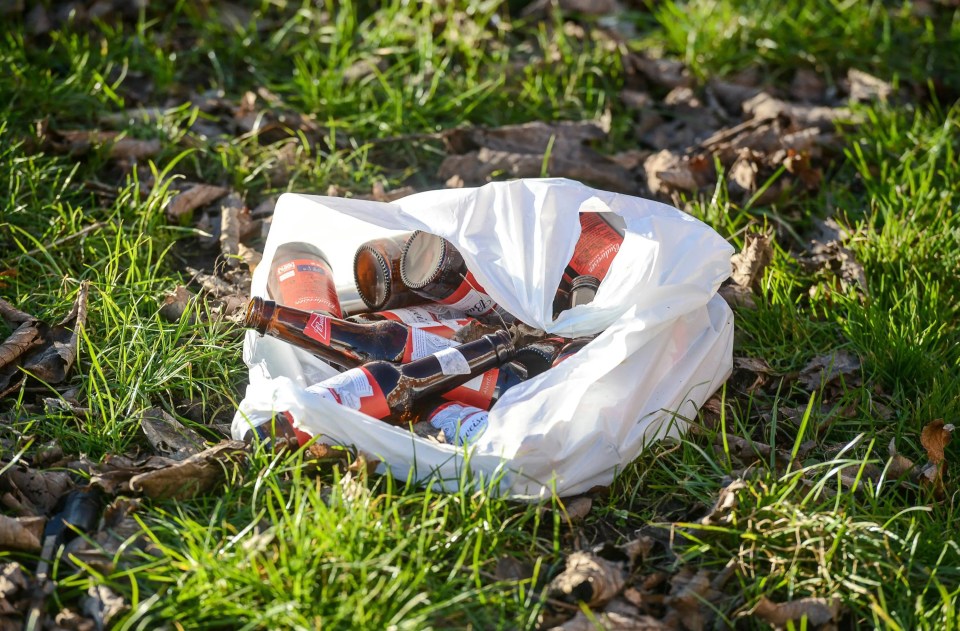 A bag of empty beer bottles left lying around