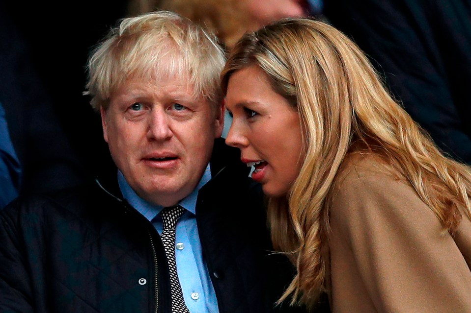 The PM’s partner Carrie surprised him with a cake at the bash