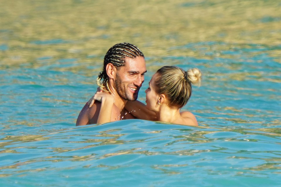 Fellaini enjoyed a dip in the sea with the stunning Russian in St Barts