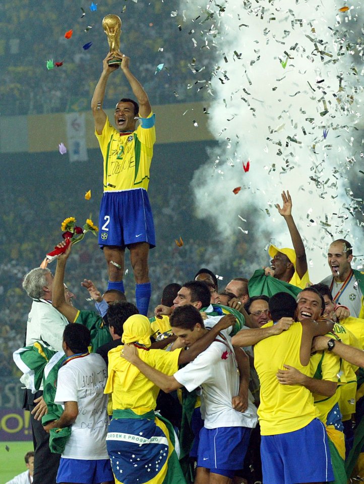 Brazil's Cafu lifts the 2002 World Cup, the last time a South American country won it