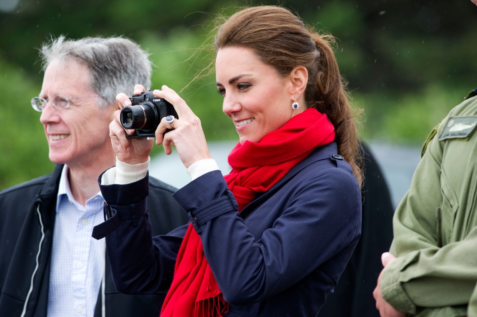 Kate finds her focus and takes a snap on a 2011 royal trip to Canada