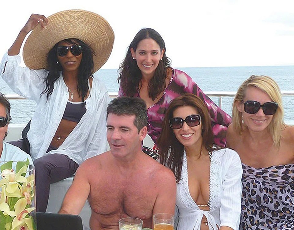 Simon Cowell on a yacht with fiancee Lauren Silverman and exes Sinitta and Mezhgan Hussainy