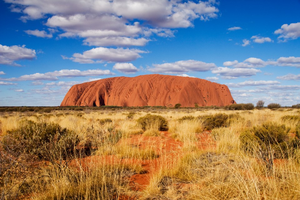 The Natural Wonder, Uluru, is a large sandstone formation in the southern part of the Northern Territory in Australia