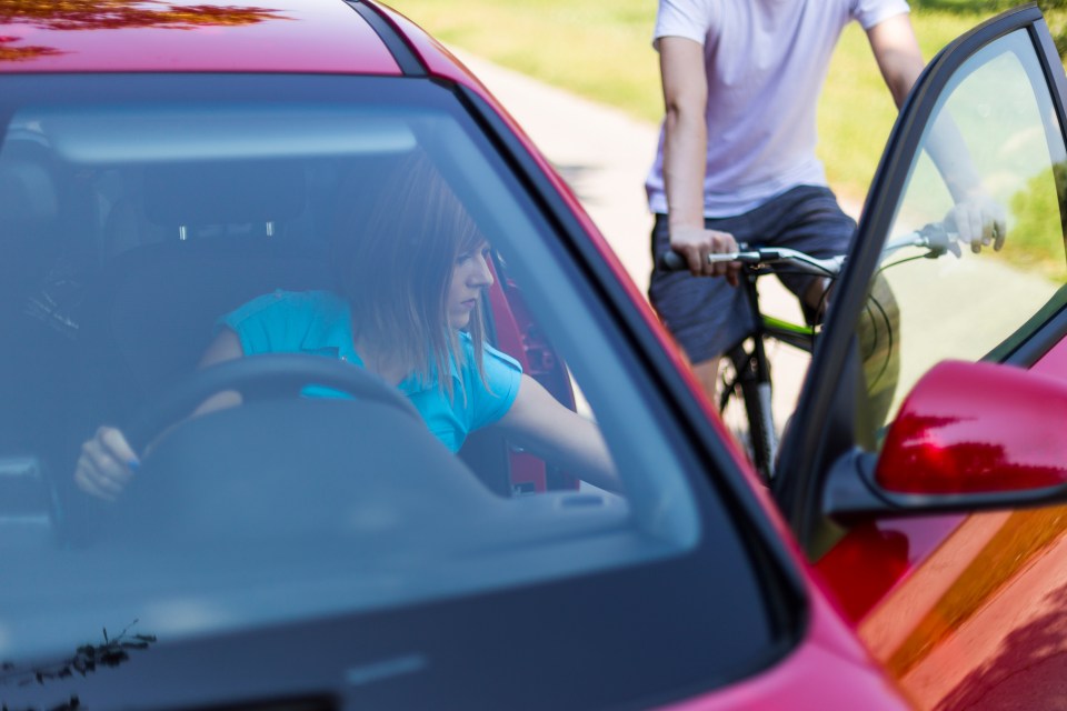 Watch out for any cyclists or pedestrians when opening a car door