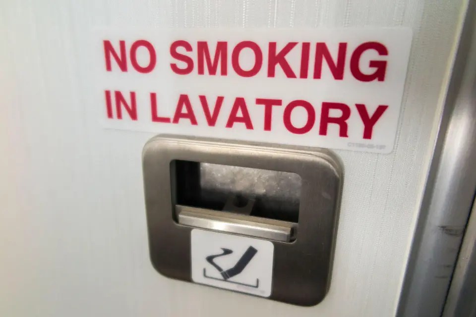 A flight attendant revealed she hates it when passengers pull the ashtray on plane toilet doors