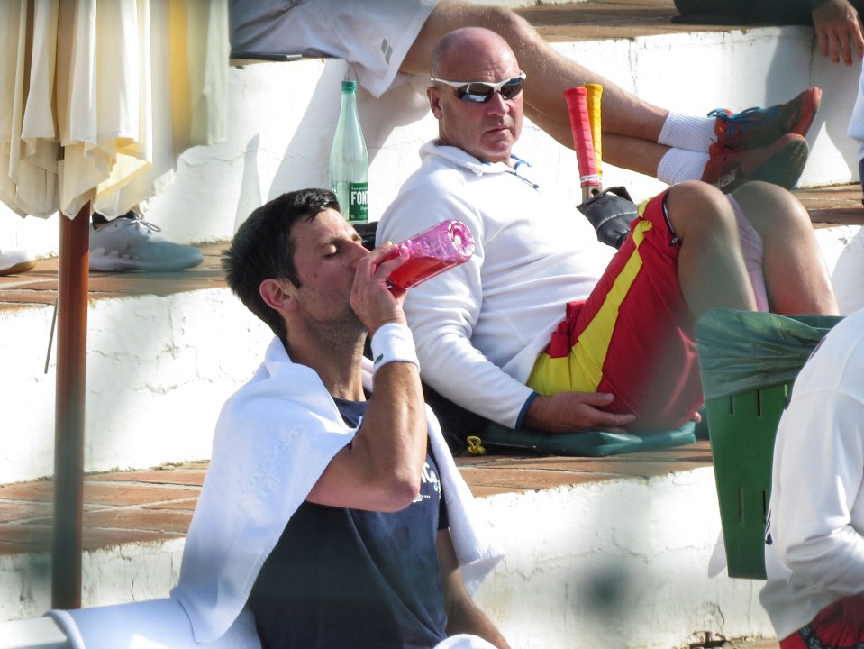 Djokovic on a tennis court in Marbella days before arriving in Australia