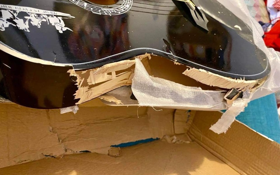 The £79 guitar was badly crushed but not completely flattened so he reckons another item may have taken the force of the vehicle when it was run over