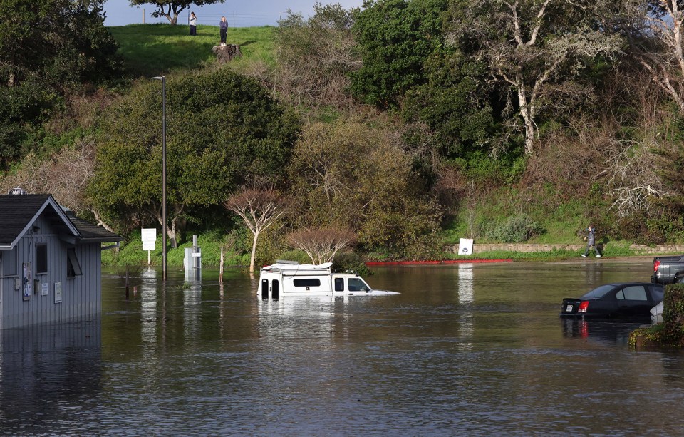 The effects of the blast were felt as far away as California where waves swept inland, causing floods - pictured Santa Cruz