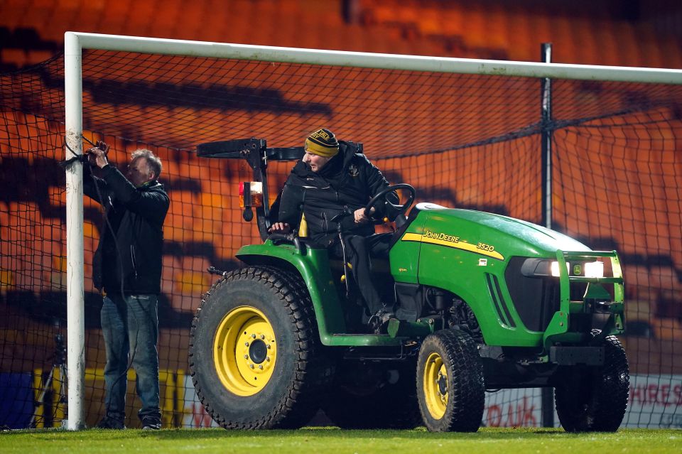 Port Vale's match with Salford saw a tractor enter the pitch to fix a goalpost