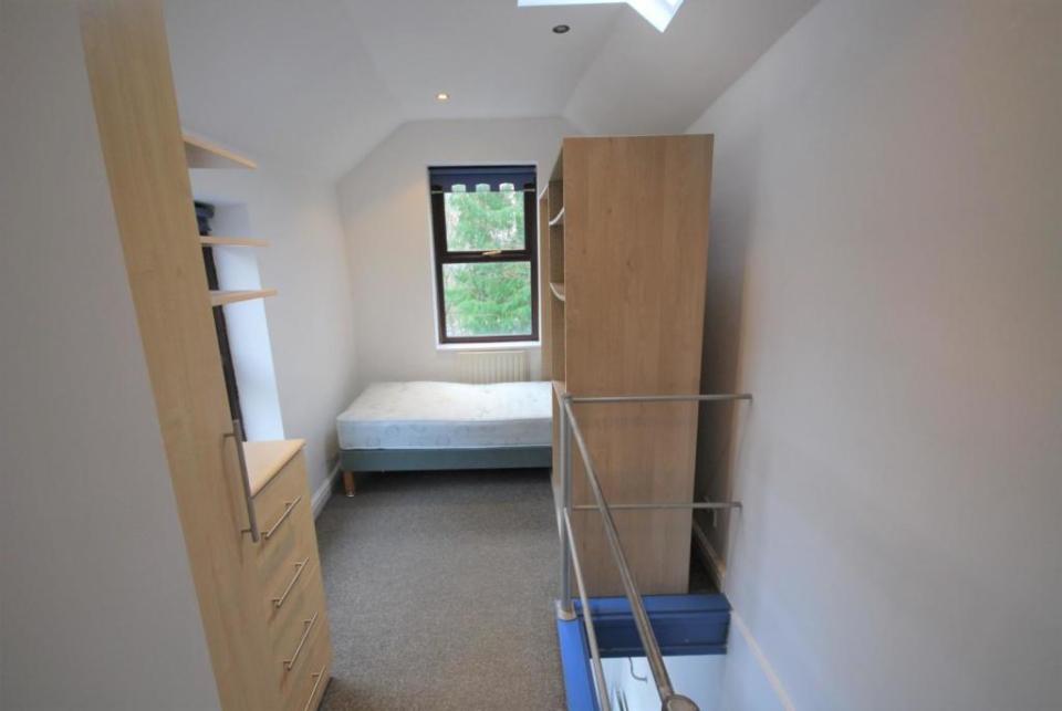 A double bed and some storage is all that can be squeezed into the upstairs bedroom