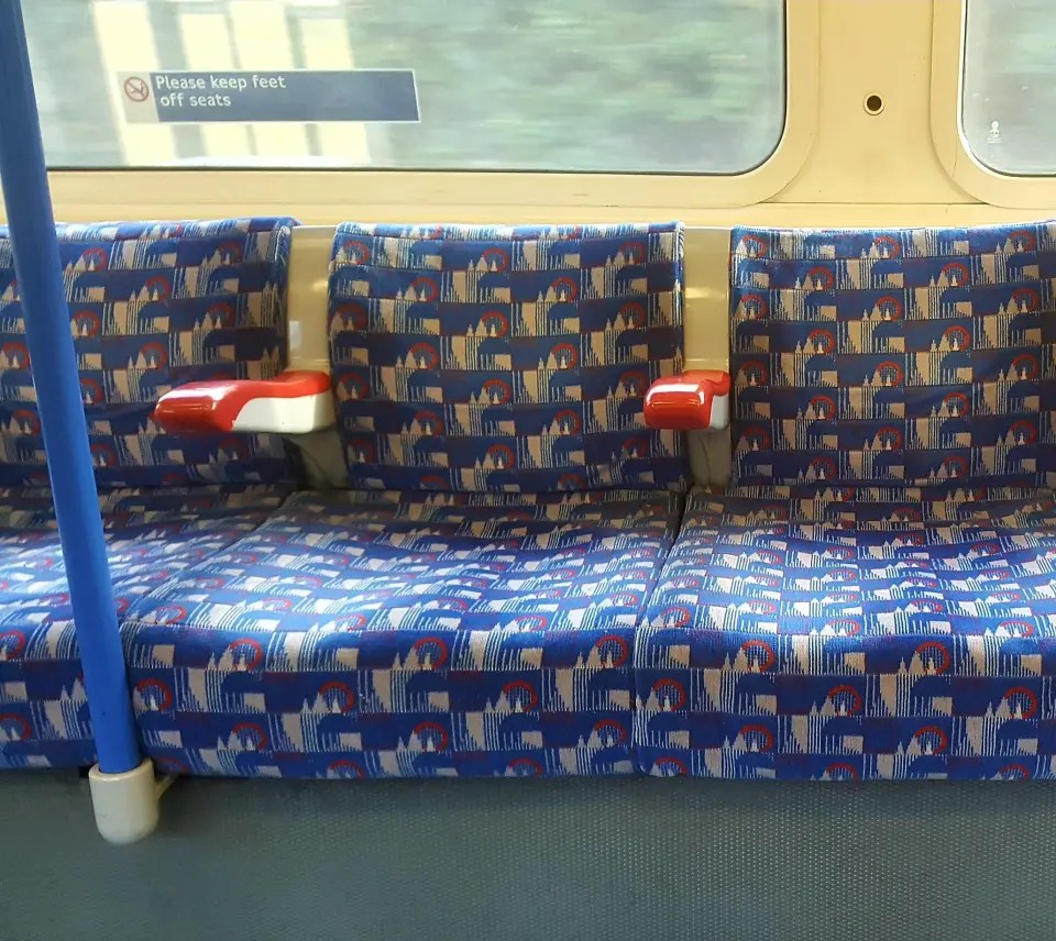 The Gunners copied the blue and white seat pattern from the Piccadilly tube line which runs past their Emirates Stadium