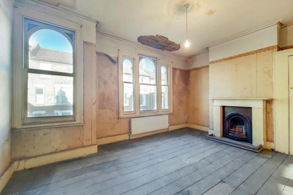 The property in Kentish Town has been completely gutted inside, will floors stripped bare and wallpaper peeling away in the damp