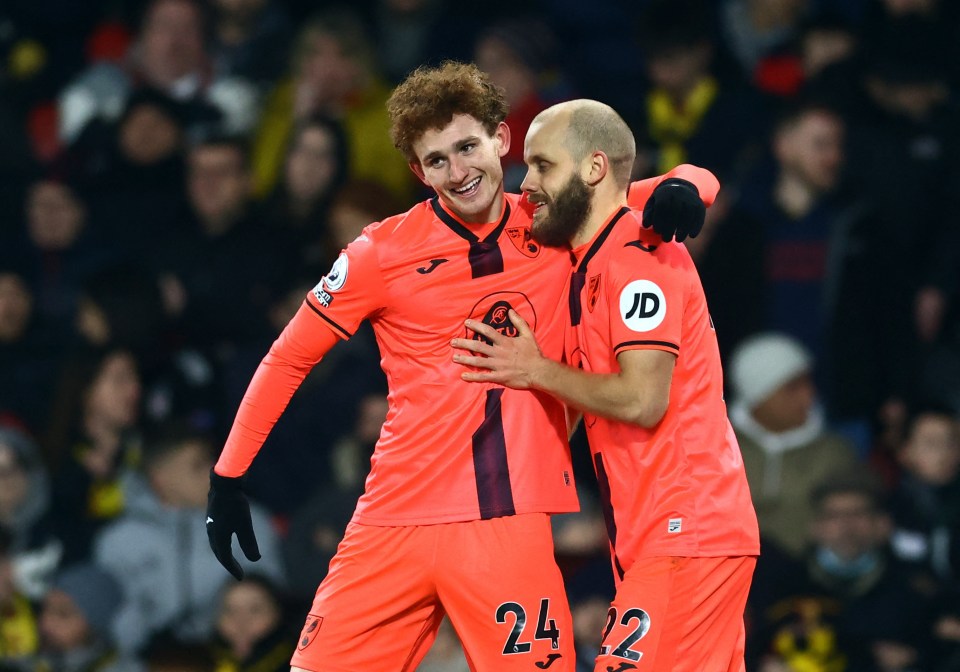 Sargent celebrated with striker Teemu Pukki after he broke the deadlock at Vicarage Road