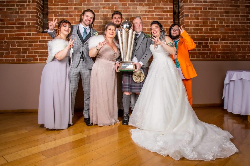 The Sid Waddell trophy took pride of place in the wedding photos