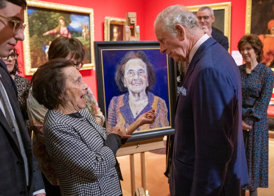 Lily with the then-Prince Charles in 2022