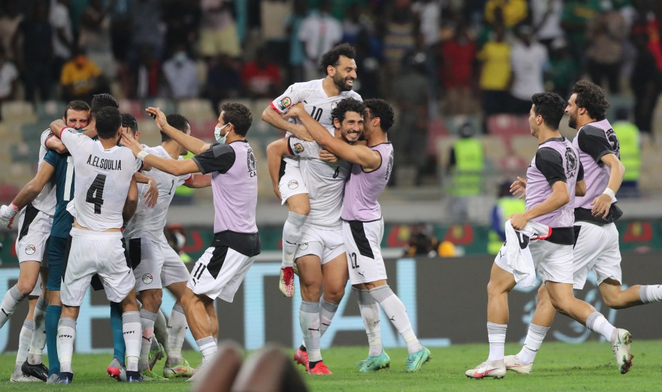 Mo Salah celebrates with his team-mates after firing Egypt into the last-eight of Afcon