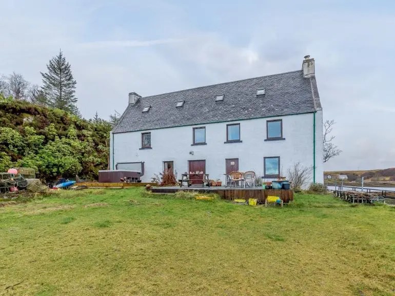 A cottage in the Scottish Highlands is available as a holiday rental and can only be accessed by crossing a floating bridge