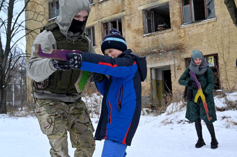 The Ukrainian military held a training day in Kiev, where civilians of all ages were given expert tips from experienced weapons instructors