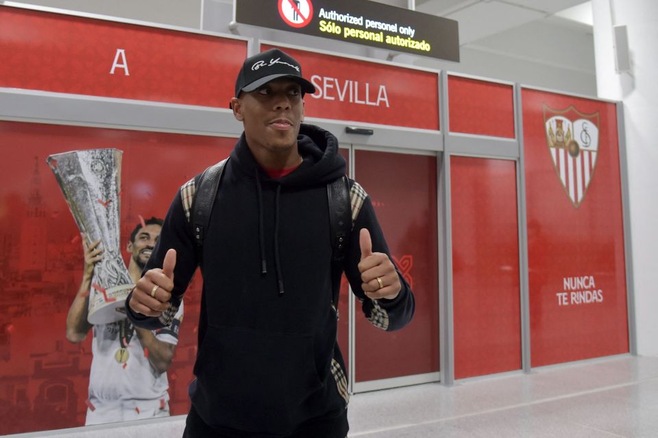 Anthony Martial pictured landing in Seville earlier on Tuesday