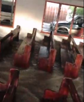 A video shows waves crashing into what appears to be a church in Tonga