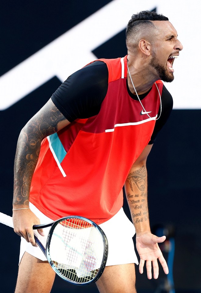 Nick Kyrgios reacts during his heated mens doubles match