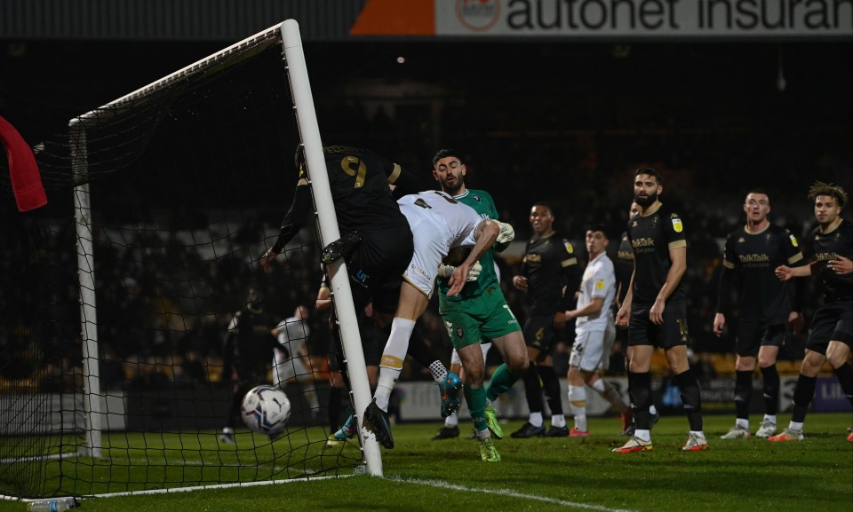 The post was knocked out of place by Vale's Connor Hall as he defended a free-kick