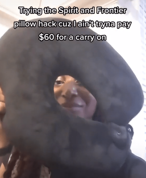 A woman shared a video on Tiktok revealing how she takes extra hand luggage on a plane - using a travel pillow