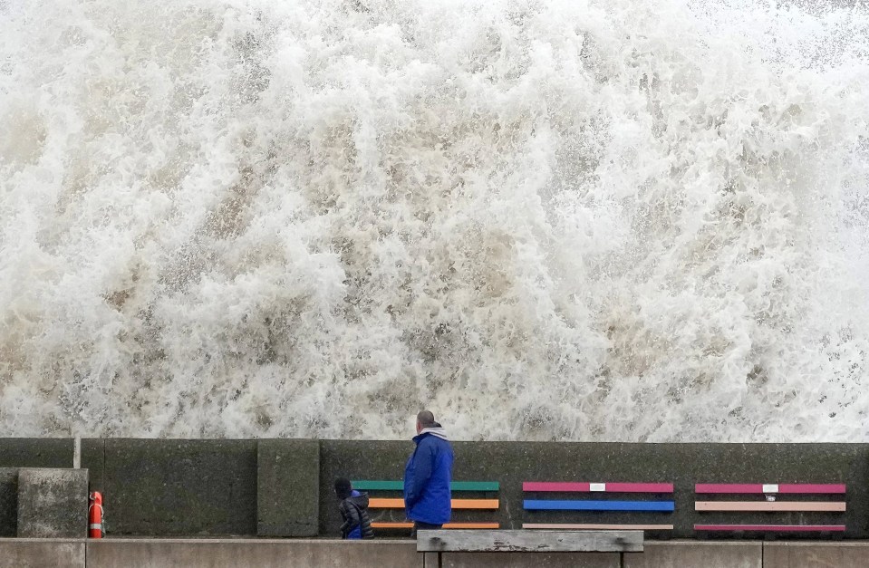 People are urged to keep away from coastlines as 100mph winds whip up huge storm surges