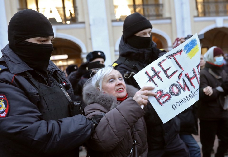 Protesters of all ages carried banners demanding peace with Ukraine