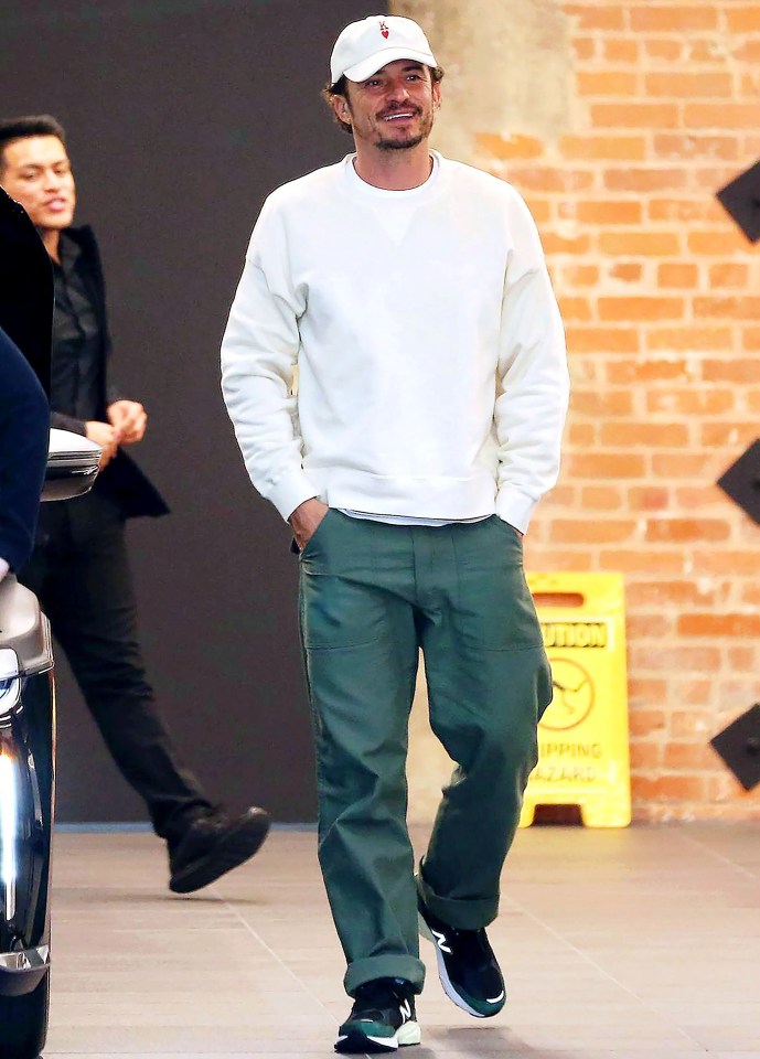 Bloom was seen smiling at the car dealership in the swanky Los Angeles neighbourhood of Beverly Hills